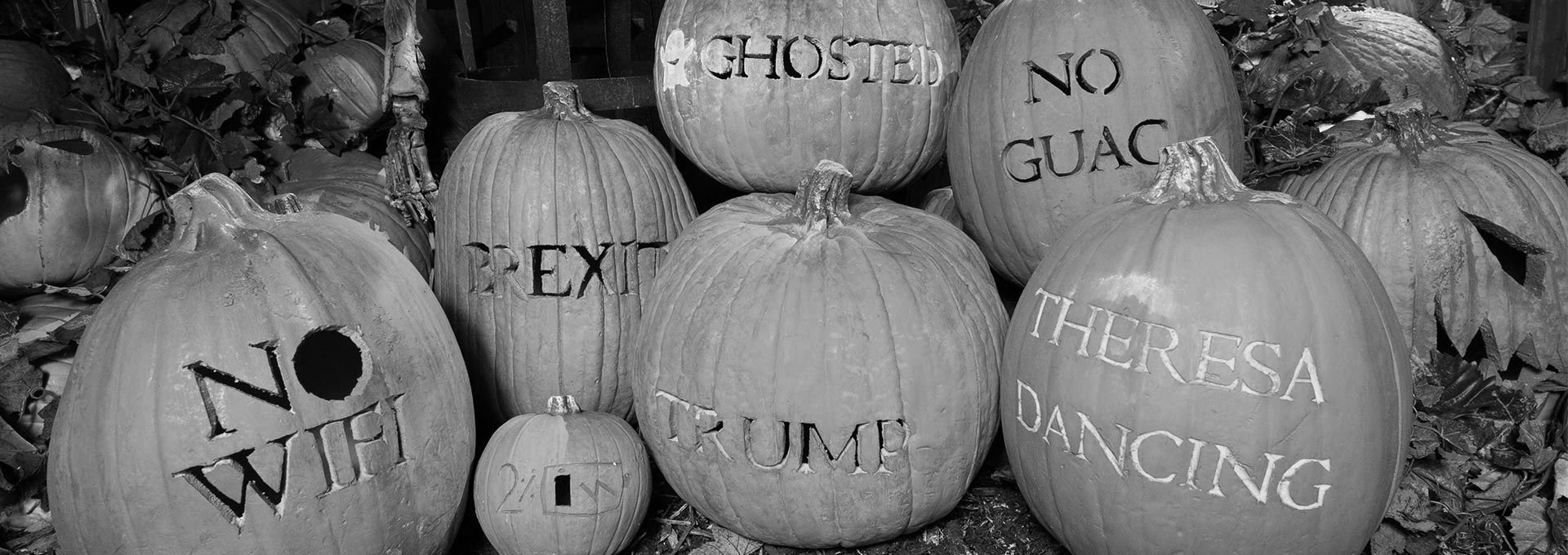 Carved pumpkins with phrases