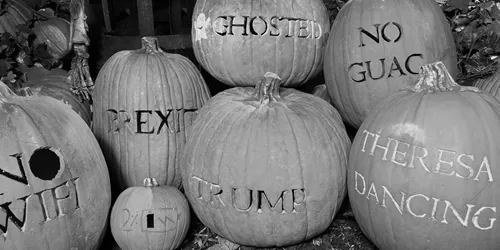 Carved pumpkins with phrases